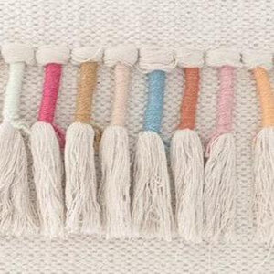 Close up of Multicolor Ropes from Rainbow Tassel Cotton Boho Throw Pillow.