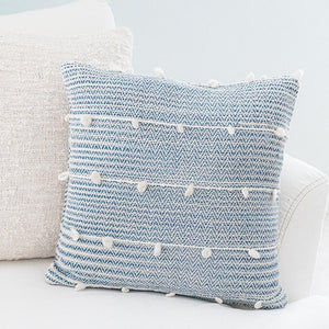 Cozy Indigo Blue Textured Stripe Throw Pillow on a white modern sofa.