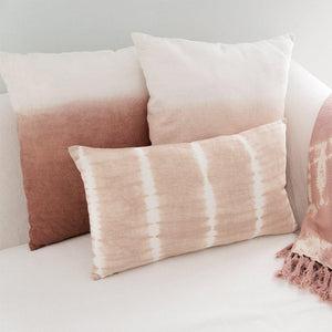 Beautiful Bohemian Pillow in Terracotta color made of Linen accompanied with two more boho pillows.
