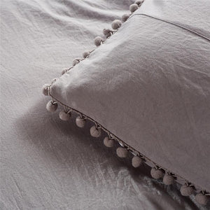 Light gray pillow covers.