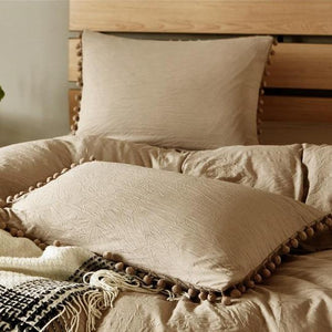 Cream color pillow covers.