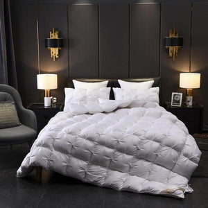 Giuseppina 1000 Thread Count Goose Down White Comforter Bedding Set in a Modern Bedroom available in Queen And King size.