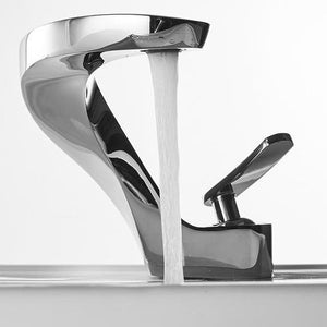 Chrom Adelaide Bathroom Faucet on a white bathroom sink with water flow opened.