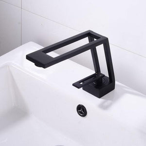 Black amelia bathroom faucet on a white modern bathroom sink.