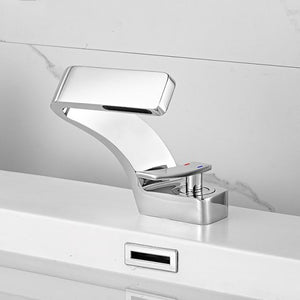 Chrome Alpha Bathroom Faucet on a white sink.