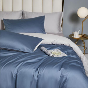 Close Up Of Ava Reversible Duvet Cover Set made of Egyptian Cotton in Pearl and Steel color.