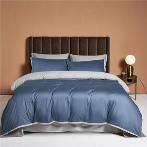 Ava Reversible Duvet Cover Set made of Egyptian Cotton in Steel and Pearl color.