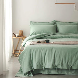 Emma Duvet Cover Set made of cotton and linen in green color with ropes.
