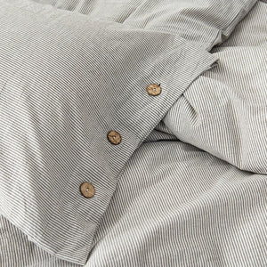 Buttons used in pillow covers from Olivia Stripe Ultra Soft Duvet Cover Set.