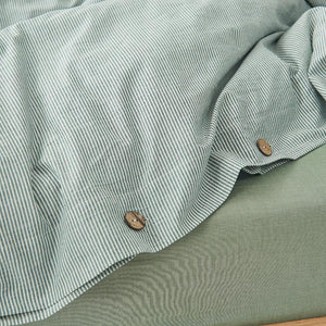 Close up of Stripe Olivia Duvet Cover Set with Buttons.