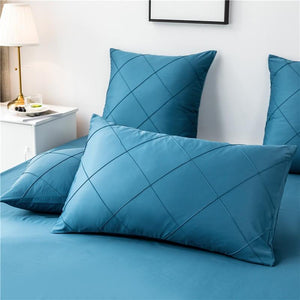 Pillow covers made of microfiber in ocean color.