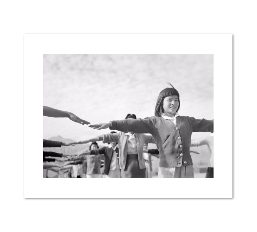 Calesthenics [sic] Female internees practicing calisthenics at Manzanar internment camp by Ansel Adams