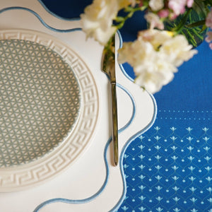 HAVEN WHITE WAVY EDGE BLUE TRIM FAUX LEATHER PLACEMAT (Set Of 4)