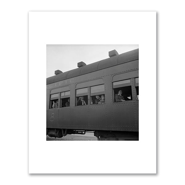 Ten cars of evacuees of Japanese ancestry are now aboard and the doors are closed by Dorothea Lange