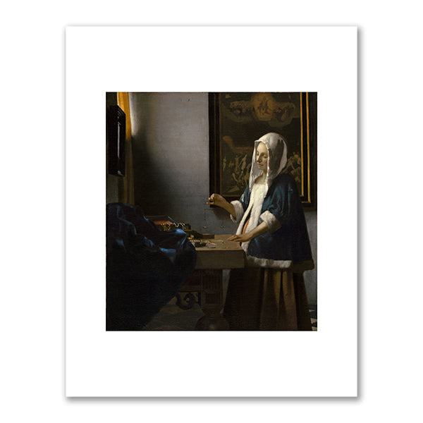 Woman Holding a Balance by Johannes Vermeer