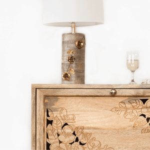 Anaya Gold Floral Wood Table Lamp on Floral Hand Carved Wood Cabinet.