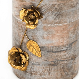 Close up of flowers crafted in brass for the Gold Floral Wood Table Lamp.