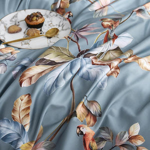 Close up of Astarte Duvet Cover set. Floral and Animals can be seen.