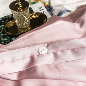 Pink Egyptian Cotton Sheets with pink button. 