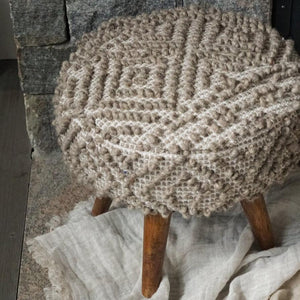 Handwoven Mocha Pattern Small Stool in Earthy Color, located in a living room of a modern house.