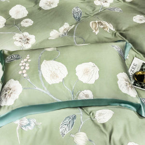 Amanecer Dorado green duvet cover set with flowers prints.