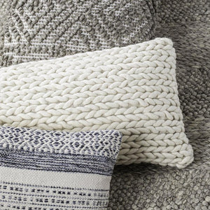 Three different throw pillows from Anaya's collection. All  pillows are handwoven and available at Home And Tower.