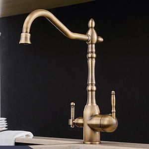 Antique Galileo Galilei Kitchen Faucet installed and mounted on a dual kitchen sink.