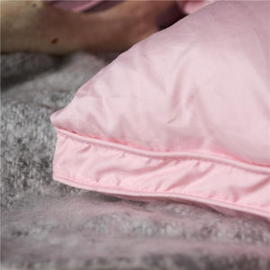 Close up of pink goose down filling pillow.