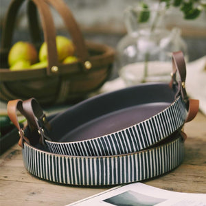 Pair of Exclusive Striped Ceramic Plates with Leather Handles.