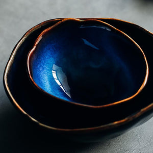 Glazed blue bowls.