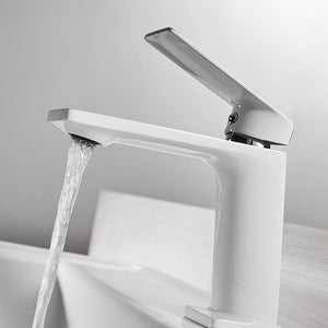 Open Tap Mary Bathroom Faucet with beautiful waterflow in white color on a white bathroom sink.