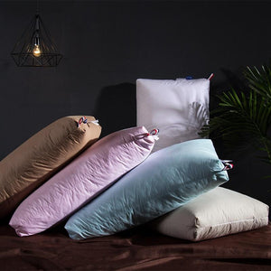 Giovanni pillows in white, pink, sky, sand and brick color.