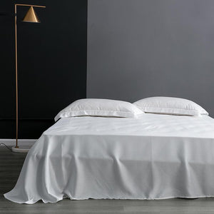 Flat bed sheets in white color.