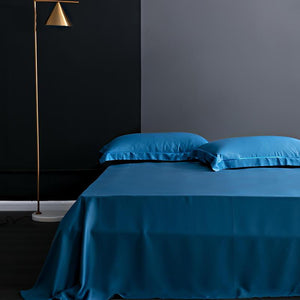 Flat bed sheets in blue color.