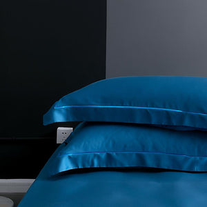 White pillow covers in blue color. Pillow covers do not come with filling.
