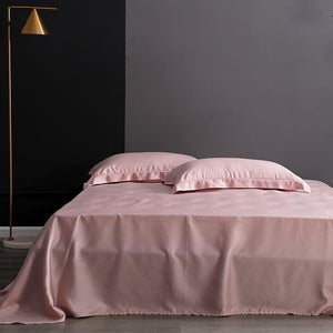 Flat bed sheets in rose color.