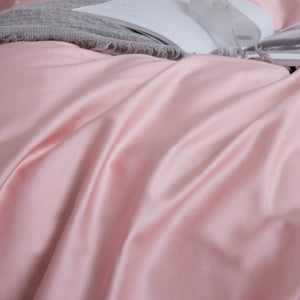 Pink bed sheets.