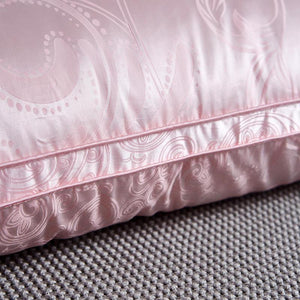 Close up of pink Vincenzo Goose Down Pillows..