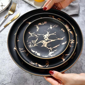 Lighting Flat Plates Nordic Collection in black color, different sizes can be appreciated.