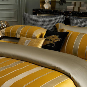 Close up of pillow covers of Mia Gradient Modern Duvet Cover Set in ochre color.