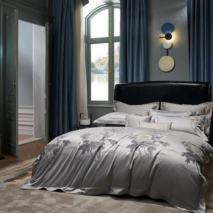 Corner view of Mia Gradient Modern Duvet Cover Set in silver color.
