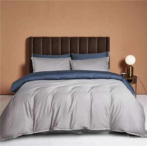Ava Reversible Duvet Cover Set made of Egyptian Cotton in Pearl and Steel color. (Opposite side).
