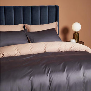 Ava Reversible Duvet Cover Set made of Egyptian Cotton in Gray and Melon color.