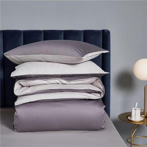 Full Set of Ava Reversible Duvet Cover Set made of Egyptian Cotton in Purple and Pearl color.