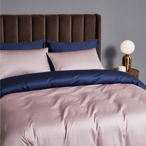 Ava Reversible Duvet Cover Set made of Egyptian Cotton in Gray and Quartz color.