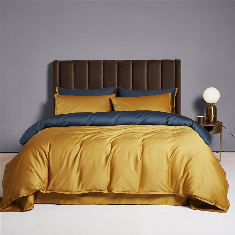 Ava Reversible Duvet Cover Set made of Egyptian Cotton in Yale and Ochre color.