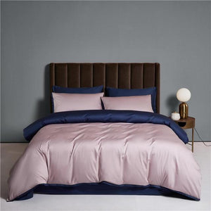 Ava Reversible Duvet Cover Set made of Egyptian Cotton in Oyster and Navy color.