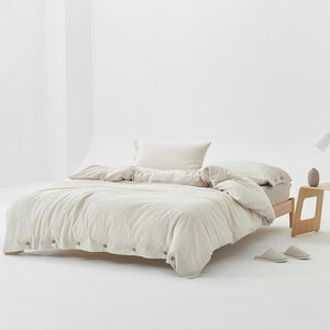Queen King size cream washed comforter with fitted bed sheets and two pillow covers.