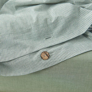 Green stripe bed sheets with buttons that belongs to Olivia Stripe Ultra Soft Duvet Cover Set.