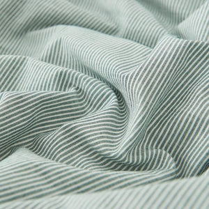 Stripe green bed sheets.